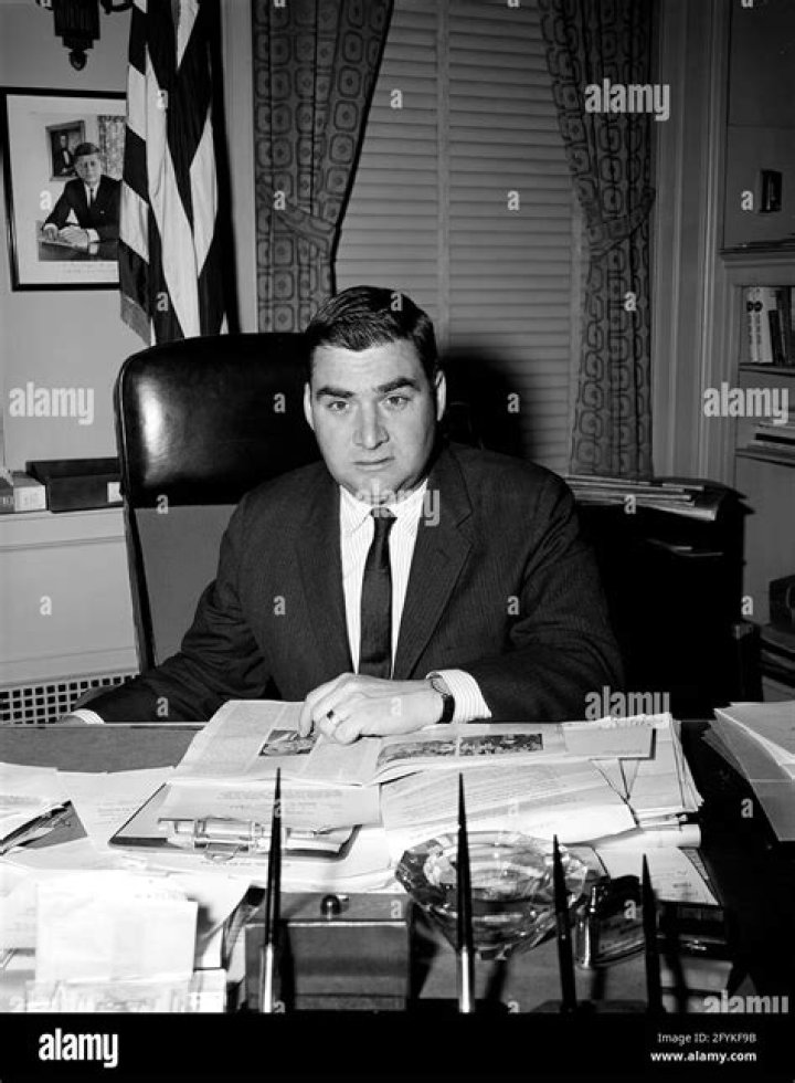 Press Secretary Pierre Salinger at his desk